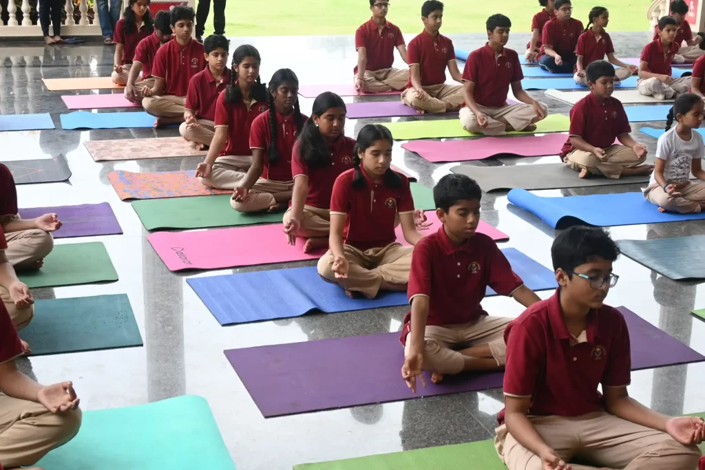 Group of students doing yoga